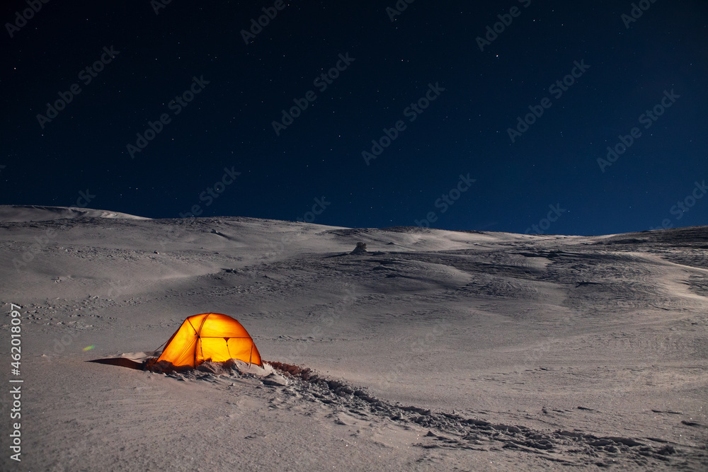 tent in the winter mountains