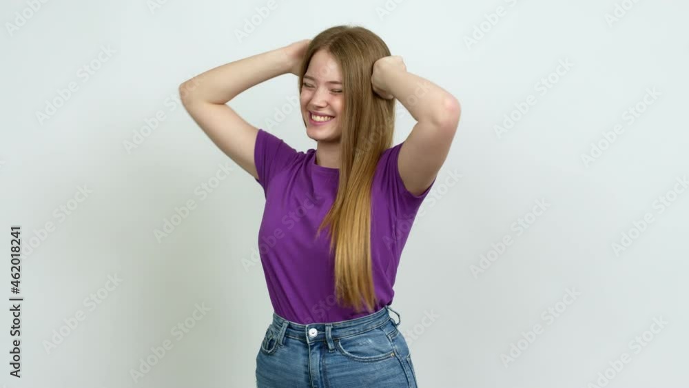 Teenager girl celebrating a victory and surprised to be successful over isolated background Teenager girl celebrating a victory and surprised to be successful over isolated background