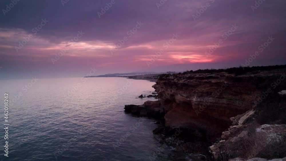 Time lapse of clouds moving over spanish coast, shoreline with cliffs. Mediterranean region of Mazarron, Sierra de las Moreras in Murcia, Spain Time lapse of clouds moving over spanish coast, shoreline with cliffs. Mediterranean region of Mazarron, Sierra de las Moreras in Murcia, Spain