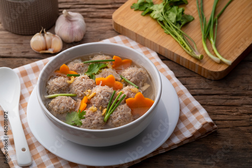 Clear glass noodle soup with Minced Pork and carrot.Asian Meatball Soup with cellophane noodle (Gaeng Jued Woon Sen)