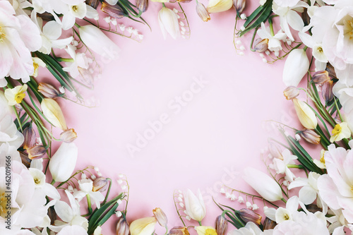 Spring blossoming tulips, pink, white and light yellow flowers festive background, bright springtime bouquet floral card