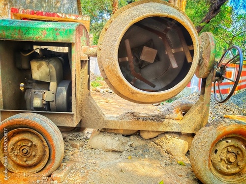 Tablou pe pânză A defunct cement mixture machine on a road