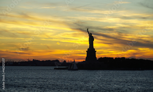 statue of Liberty. the statue of liberty at sunset. the symbol of freedom. © samy