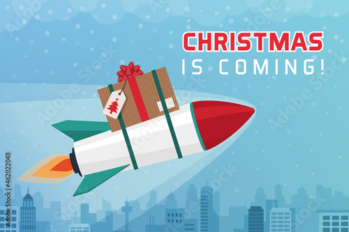Rocket flying in the sky and bringing a Christmas gift