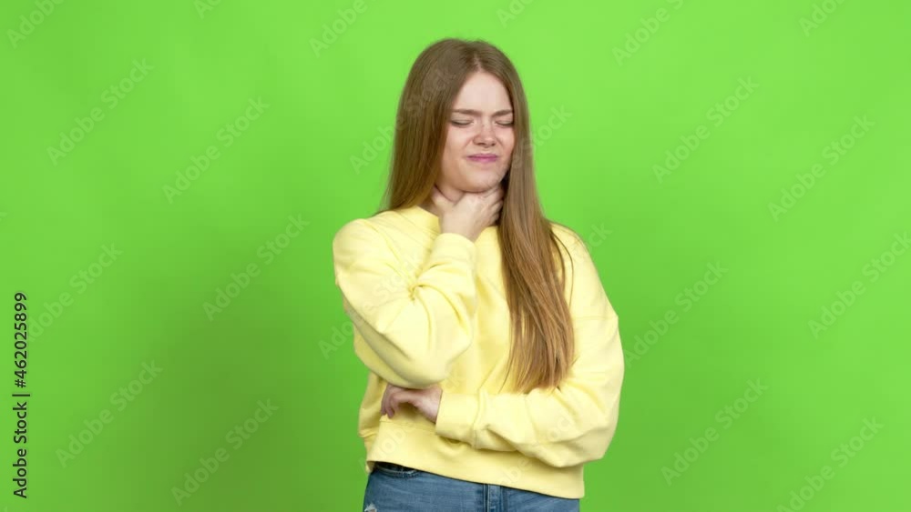 Teenager girl with sore throat over isolated background. Green screen chroma key Teenager girl with sore throat over isolated background. Green screen chroma key