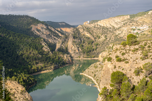The El Molinar reservoir, in Castilla La Mancha (Spain) with the sanctuary of Cristo de la Vida in Villa de Ves 