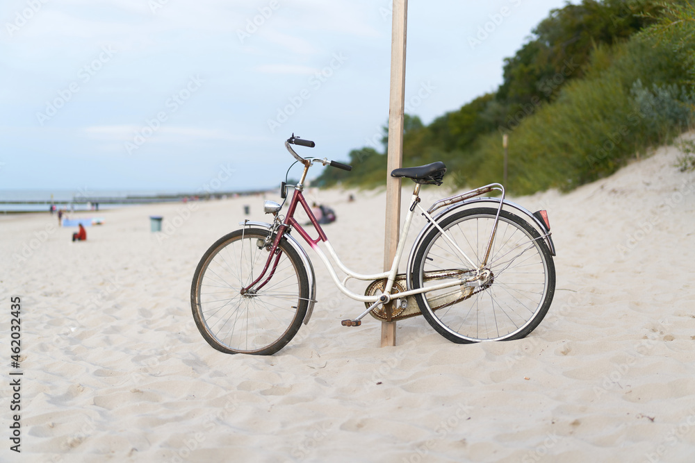 Fototapeta premium Bicycle on the beach of the Polish Baltic Sea near Kolobrzeg