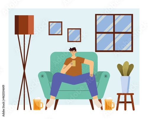 man drinking beer in livingroom
