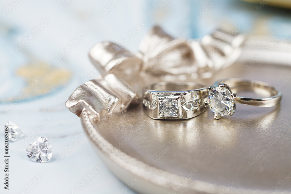 Close up of engagement diamond ring. Love and wedding concept. (soft and selective focus) Close up of engagement diamond ring. Love and wedding concept. (soft and selective focus)
