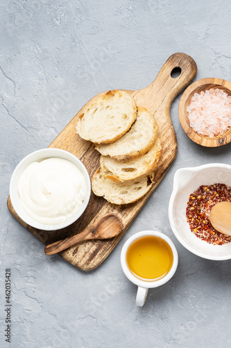 Fried toast made of fresh bread with sauce and olive oil. Alternative handmade food cooking concept. Top view, copy space photo