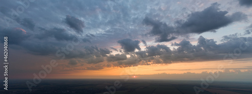 Panorama of the sky with clouds at sunset