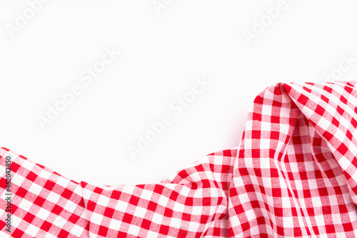 Fabric textile crumpled on white background with copy space. Tablecloth picnic Red, white texture checkers. on white background.
