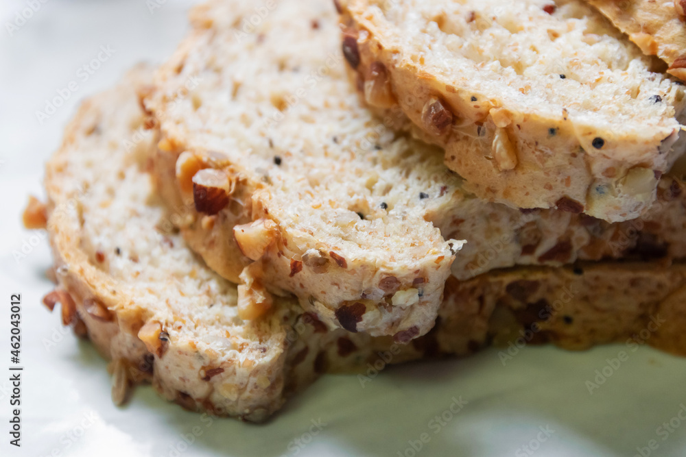 Super grains sliced bread. Health food to reduce high blood pressure, cholesterol and healthy heart. Health food concept with super foods. Top view. Super grains sliced bread. Health food to reduce high blood pressure, cholesterol and healthy heart. Health food concept with super foods. Top view.