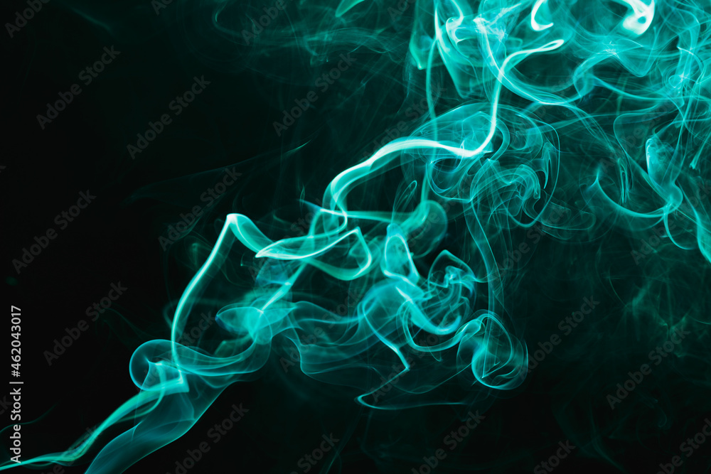Smoke floating on dark background Smoke floating on dark background