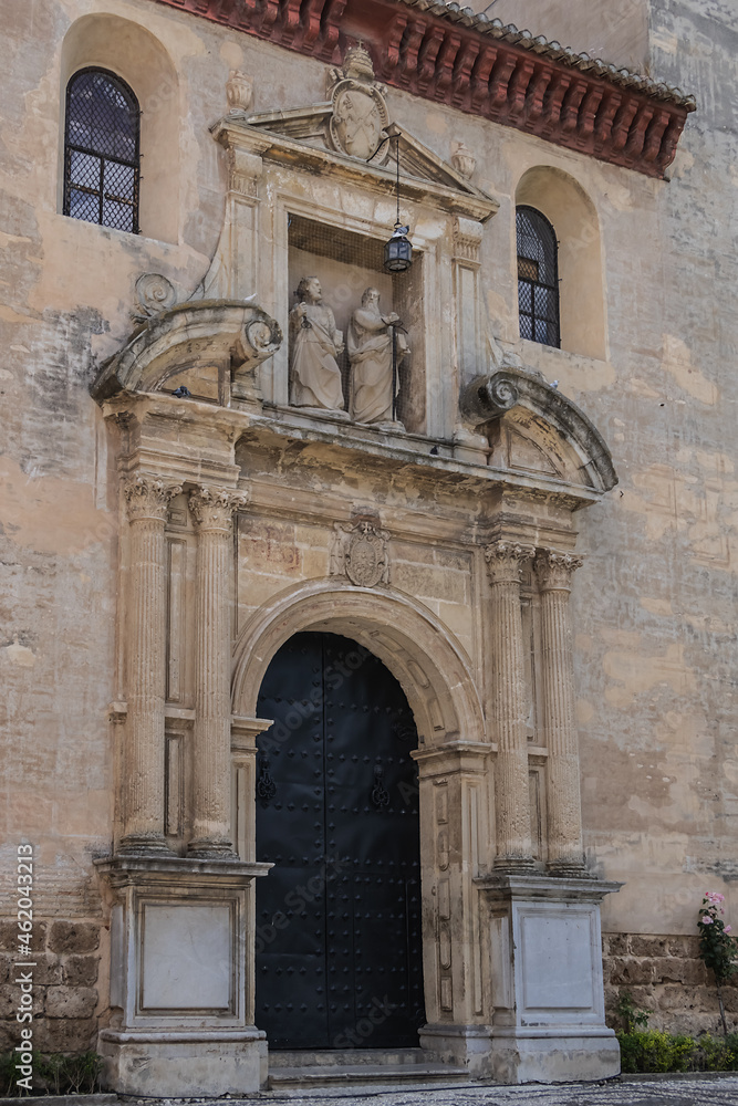 Renaissance facade of Granada church (Parroquia) de San Pedro y San Pablo build in 1567, one of most magnificent examples of Andalusian Renaissance at end of XVI century. Andalusia, Spain. Renaissance facade of Granada church (Parroquia) de San Pedro y San Pablo build in 1567, one of most magnificent examples of Andalusian Renaissance at end of XVI century. Andalusia, Spain.