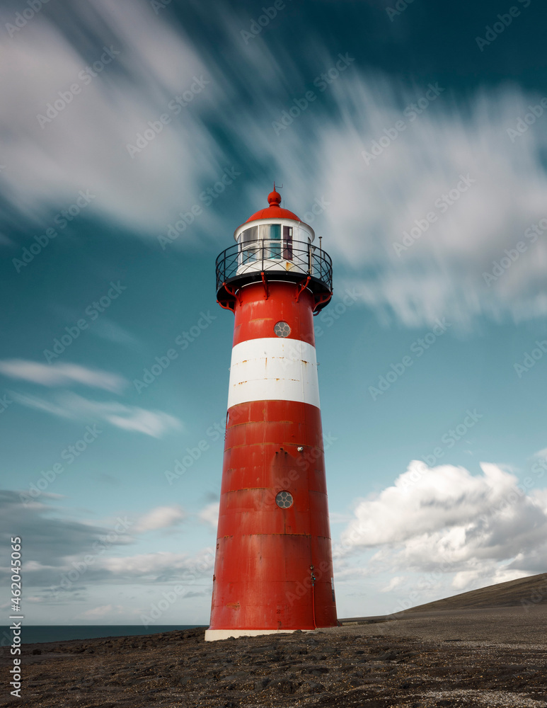 small lighthouse in the coast village Westkappele on the coast of Zeeland in The Netherlands
