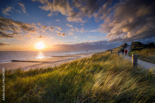 sunset at the beach near the village of Zoutelande on the coast of the province Zeeland photo