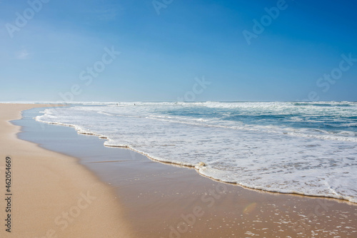 small wave at the edge of a lagoon