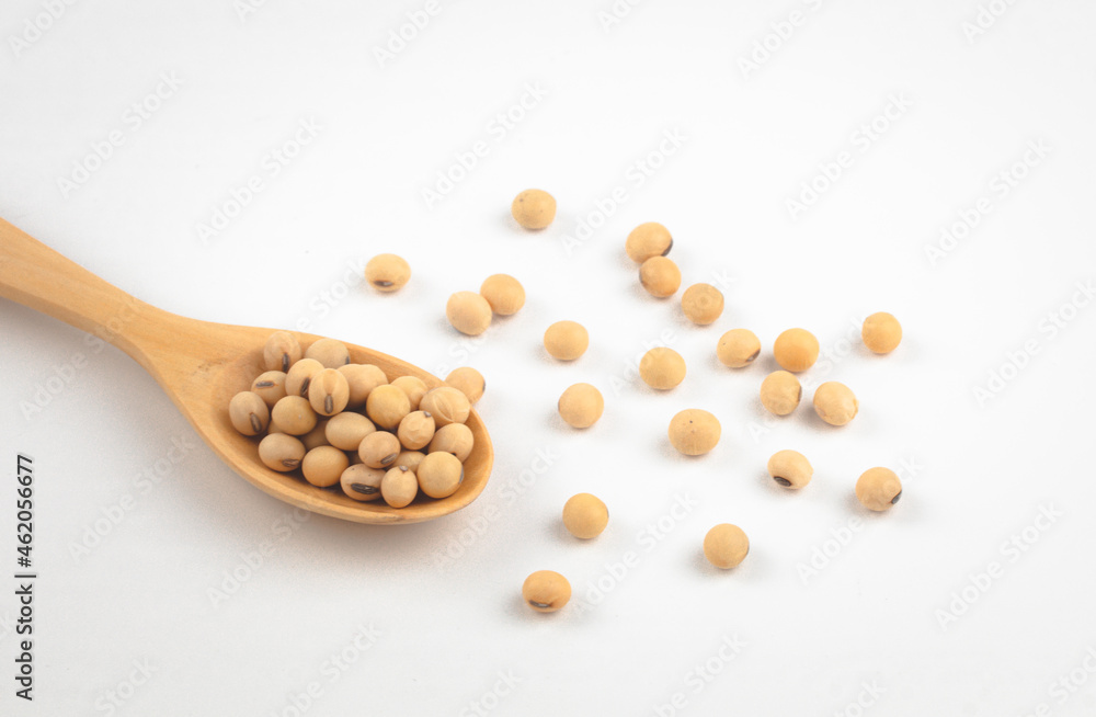 Soybean in wooden spoon with white background Soybean in wooden spoon with white background