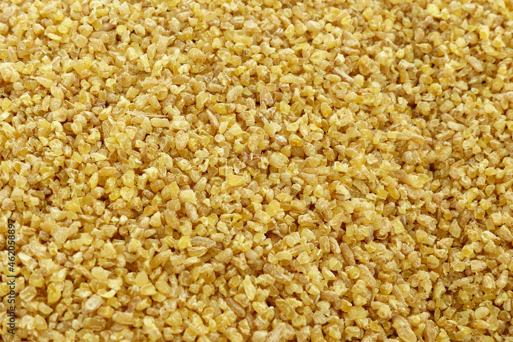 Organic bulgur made from wheat for pilaf in a bowl, close-up bulgur, Organic bulgur made from wheat for pilaf in a bowl, close-up bulgur,