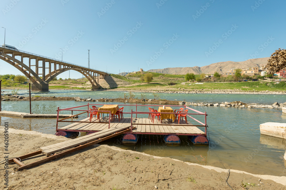Floating dining room of a restaurant on the waters of the Tigris river in Turkey