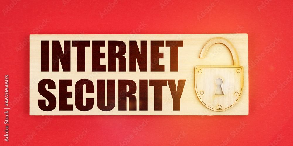 On a red background there is a small plaque on it with a lock and an inscription - Internet security