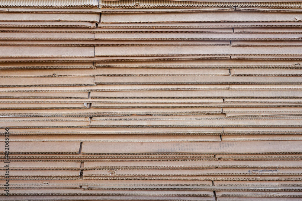 Close-up photo of brown cardboard sheets from under the boxes Close-up photo of brown cardboard sheets from under the boxes