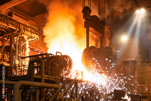 Photography Pouring molten metal into a metallurgical electric arc furnace