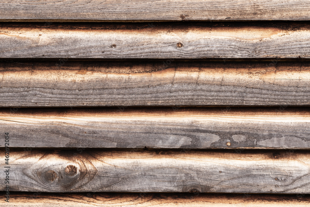 Brown old boards laid without gaps on the roof Brown old boards laid without gaps on the roof