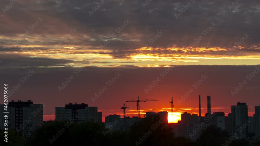 Townscape with clouds at sunset, time lapse. Townscape with clouds at sunset, time lapse.