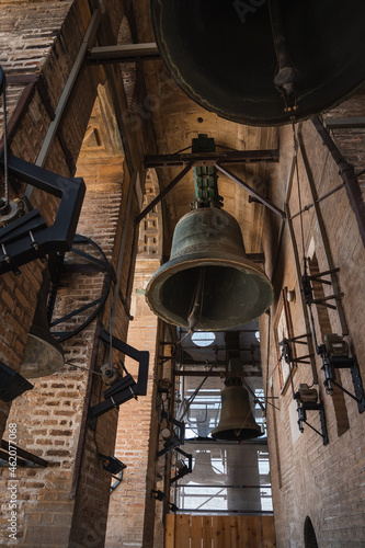 an antique black iron bell