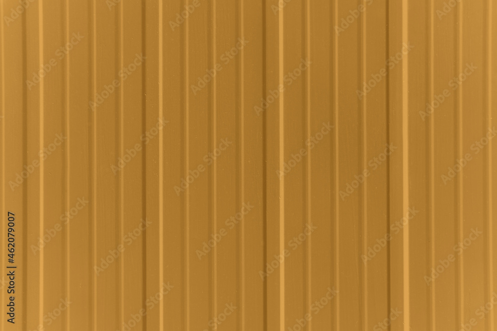 Obraz premium Orange metallic panel, striped exterior design background.