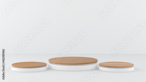 Three white display podiums with wood, the same for placing beauty products, creams, rings. Pedestal, stand with white background.