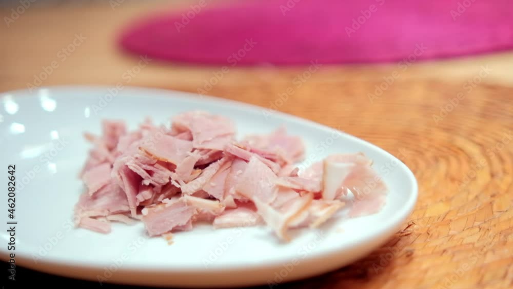Fresh chopped turkey ham on a white plate Fresh chopped turkey ham on a white plate