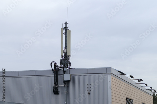 Telecommunication radio antennas and 4G, 5G communications. Installed on the roof of the building