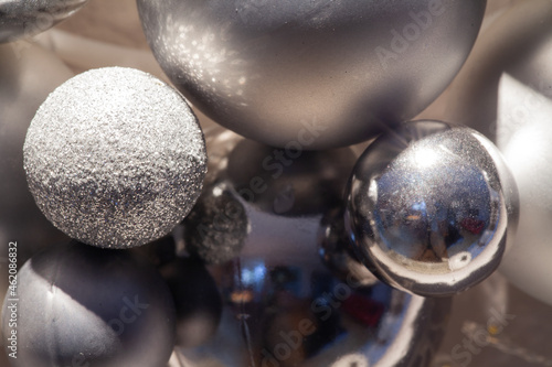 details of an advent wreath with shiny Christmas baubles