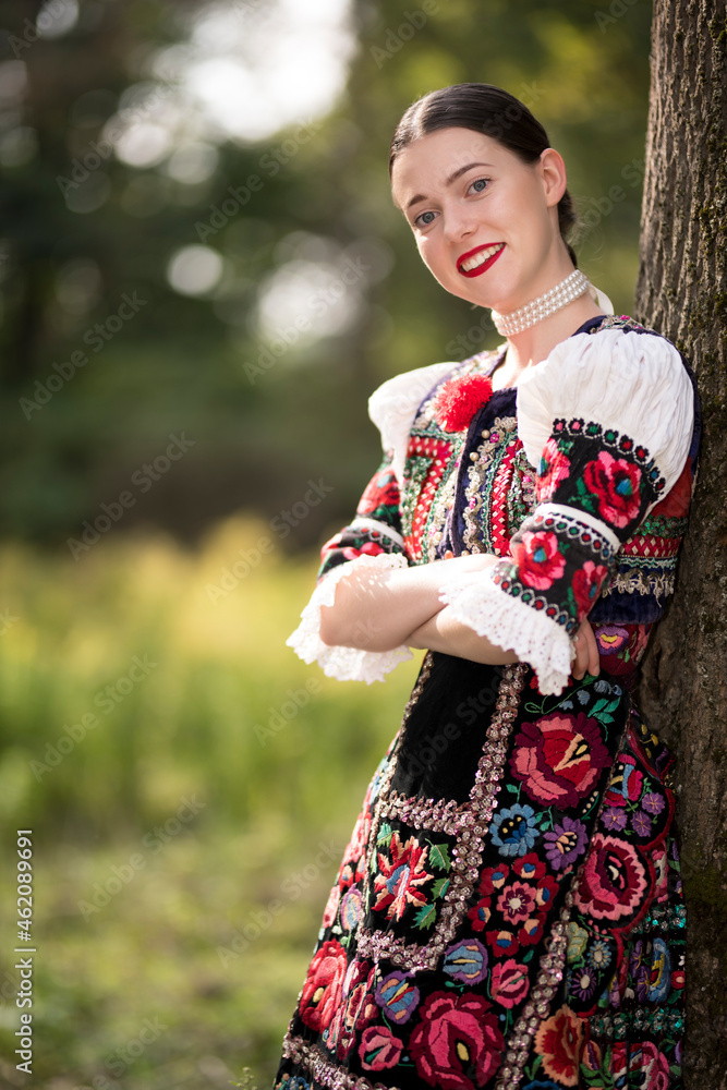 Young beautiful slovak woman in traditional dress. Slovak folklore Young beautiful slovak woman in traditional dress. Slovak folklore