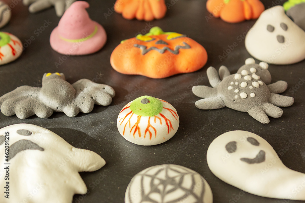 Halloween marshmallow on a dark background. Flat lay, selective focus