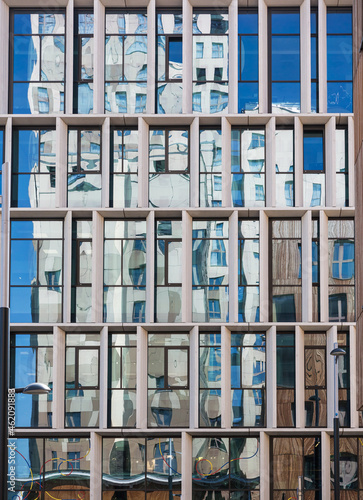 windows of a building with colorful reflections 