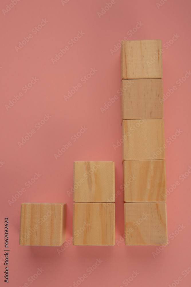 Wooden cubes stacked in the form of statistics Wooden cubes stacked in the form of statistics