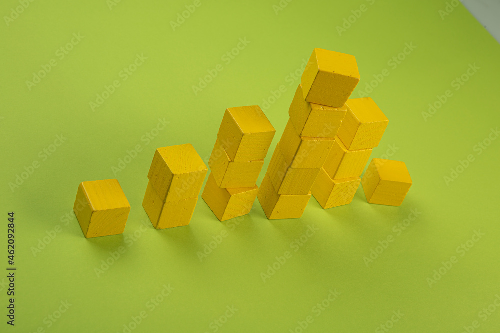 Wooden cubes stacked in the form of statistics Wooden cubes stacked in the form of statistics