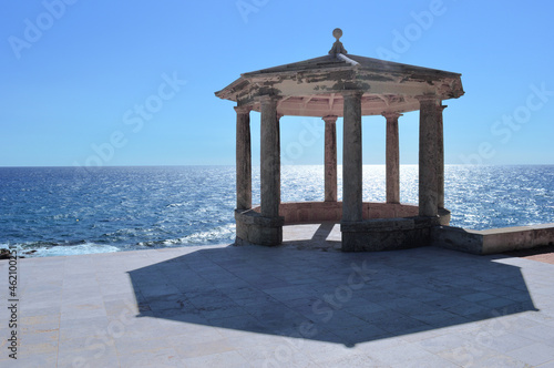 Holidays and Travels - Photo of an ancient temple in front of the sea in a sunny day - Beach and seaside in S'Agaro, Lloret de Mar (Spain)