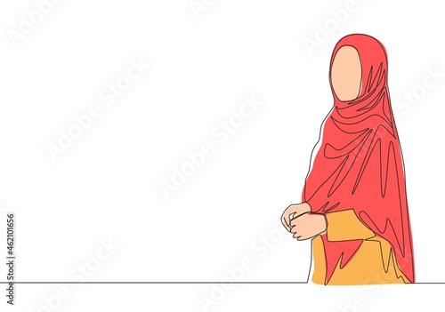 Single continuous line drawing of young happy muslimah girl with headscarf standing and pose nicely. Cute malay women model in trendy hijab fashion concept one line draw design vector illustration