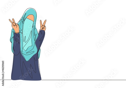Single continuous line drawing of young cute saudi arabian muslimah wearing burqa and giving peace gesture. Traditional muslim woman niqab with hijab concept one line draw design vector illustration