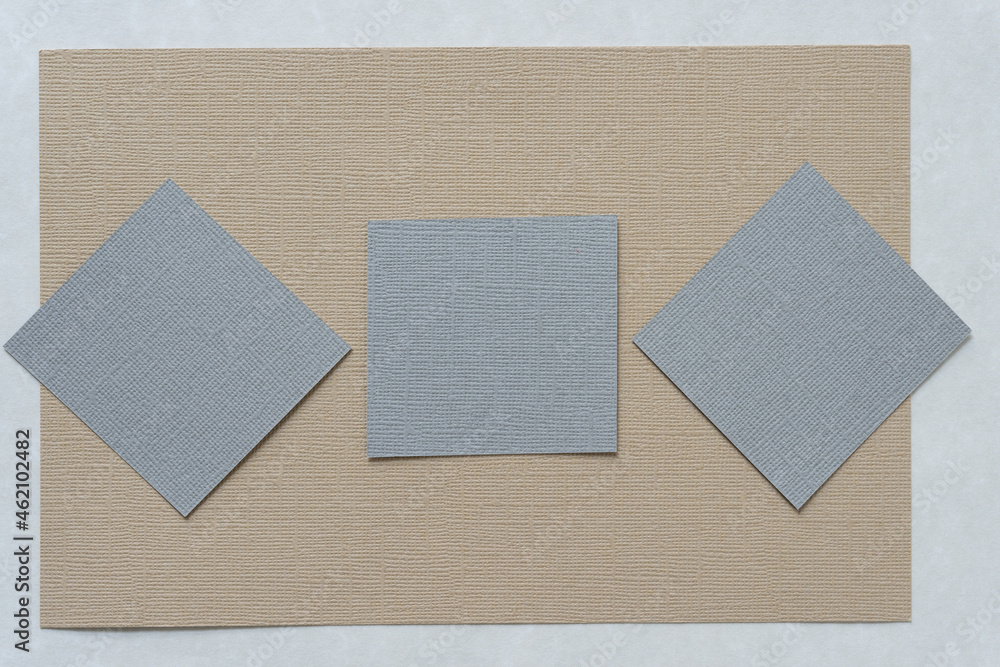 paper squares on beige paper paper squares on beige paper