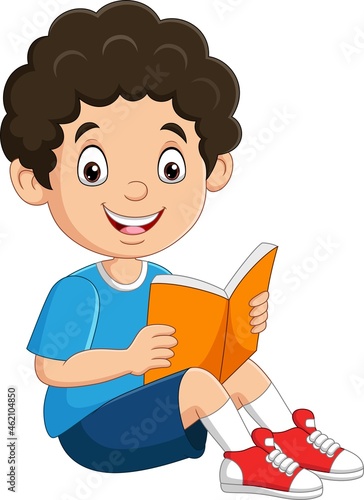 Happy boy sitting with reading a book