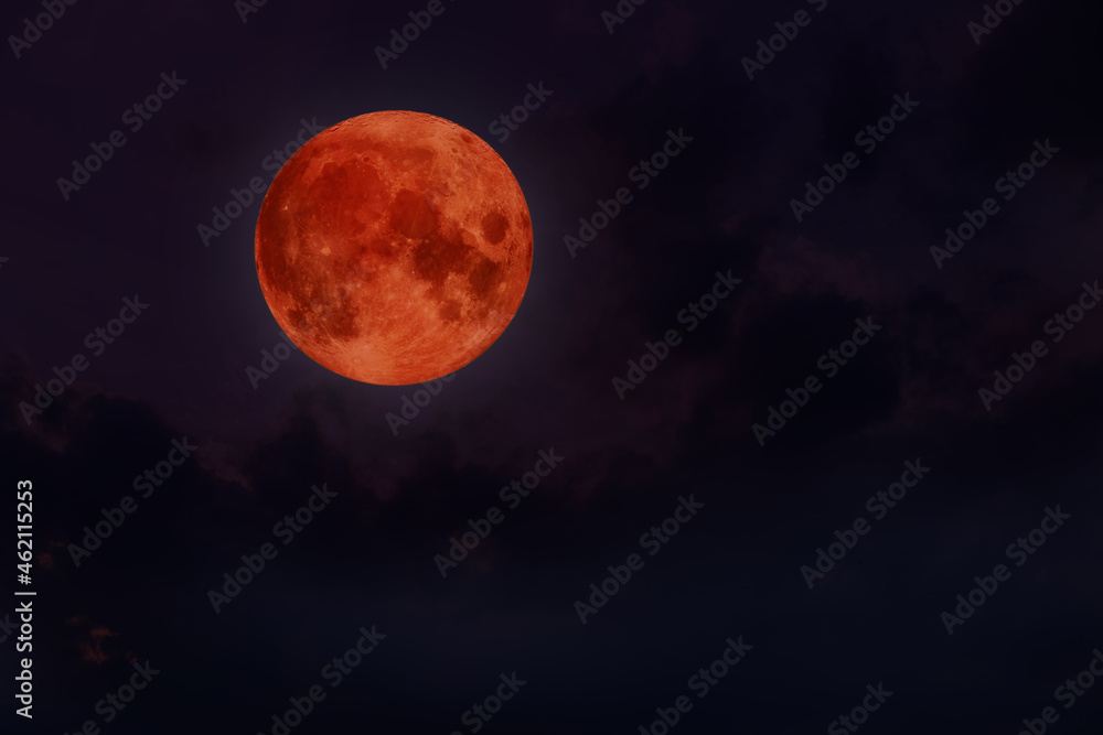 blood moon in black sky.