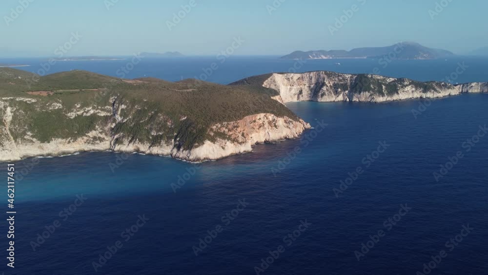 Aerial: Ionian island with blue sea water in Lefkada, Greece - drone top wide shot Aerial: Ionian island with blue sea water in Lefkada, Greece - drone top wide shot