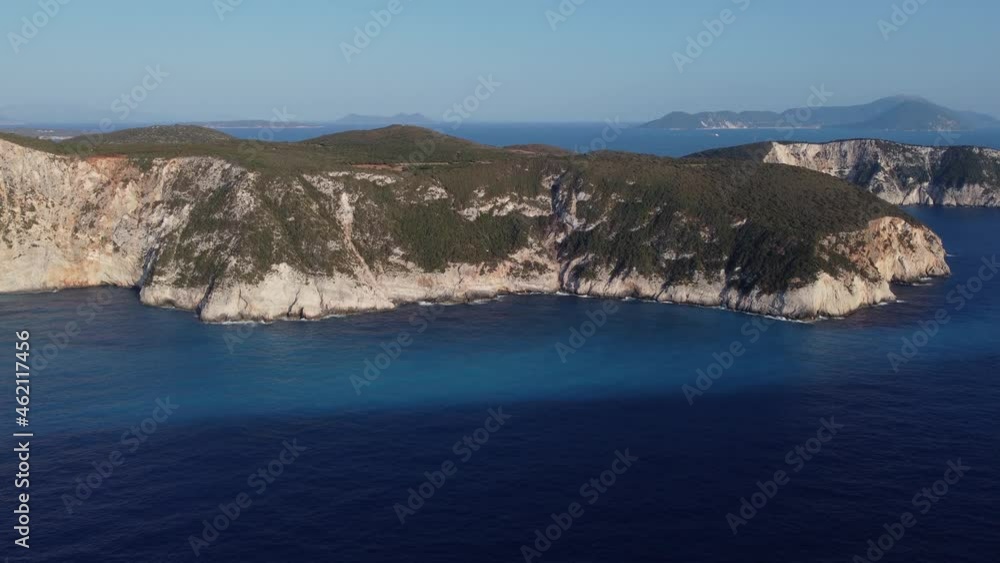 Aerial: Ionian island into Mediterranean Sea at Lefkada, Greece - drone wide shot Aerial: Ionian island into Mediterranean Sea at Lefkada, Greece - drone wide shot