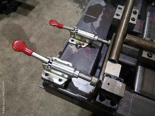 Obraz na plátně Close up clamping jig and workpieces with manual quick clamp for  welding proces